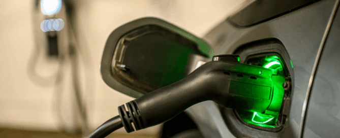 EV battery charging a car in the garage