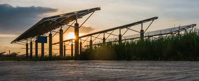 Commercial solar panels in Arizona at sunset, showing smart energy investments by businesses this summer – Sun Energy Today.