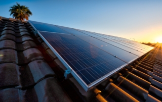 Rooftop solar panels in Arizona soaking up intense summer sun—learn heat-proof tips in the June Survival Guide by Sun Energy Today.