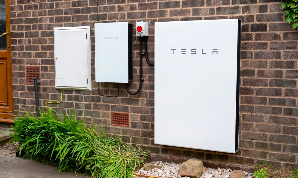 photo of a Tesla power wall unit with storage installed on a wall