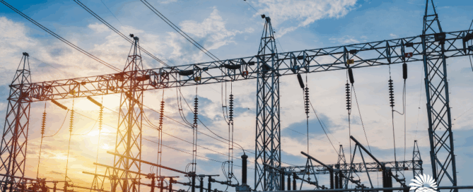 Electrical grid infrastructure at sunset, highlighting Arizona's energy stability concerns with insights from Sun Energy Today.