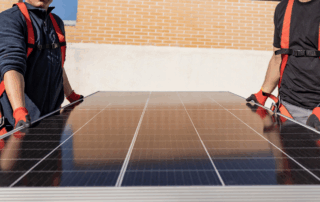 Sun Energy Today Arizona solar installers carrying solar panel for home installation, helping homeowners harness abundant sunshine for energy savings in 2025