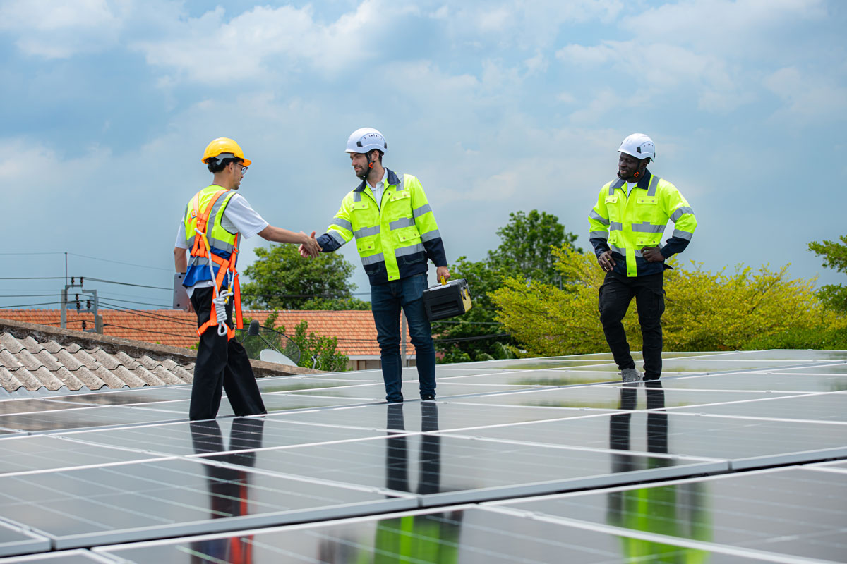 Sun Energy Today solar panel maintenance team inspecting rooftop solar panels to ensure optimal system performance and long-term reliability.
