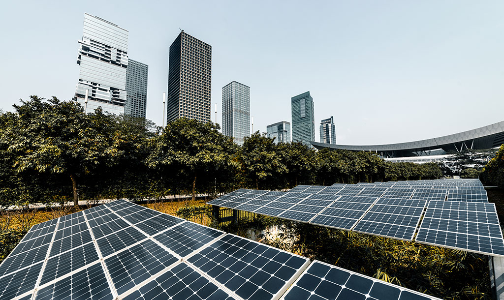 Sun Energy Today commercial solar panels near city buildings, showcasing sustainable urban energy solutions and modern solar technology.