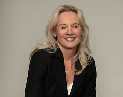 Carolyn Herrera, Sun Energy Today partner and Founder of A&C Enterprises, professional headshot portrait.