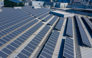 Commercial rooftop solar panels illustrating commercial solar tax incentives, PPA financing, and renewable energy solutions for businesses.